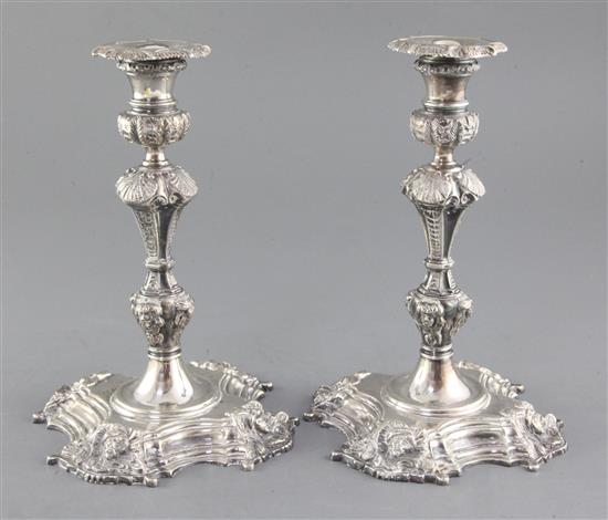 An ornate pair of 1960s Irish cast silver candlesticks by Royal Irish Silver Ltd, 56.5 oz.